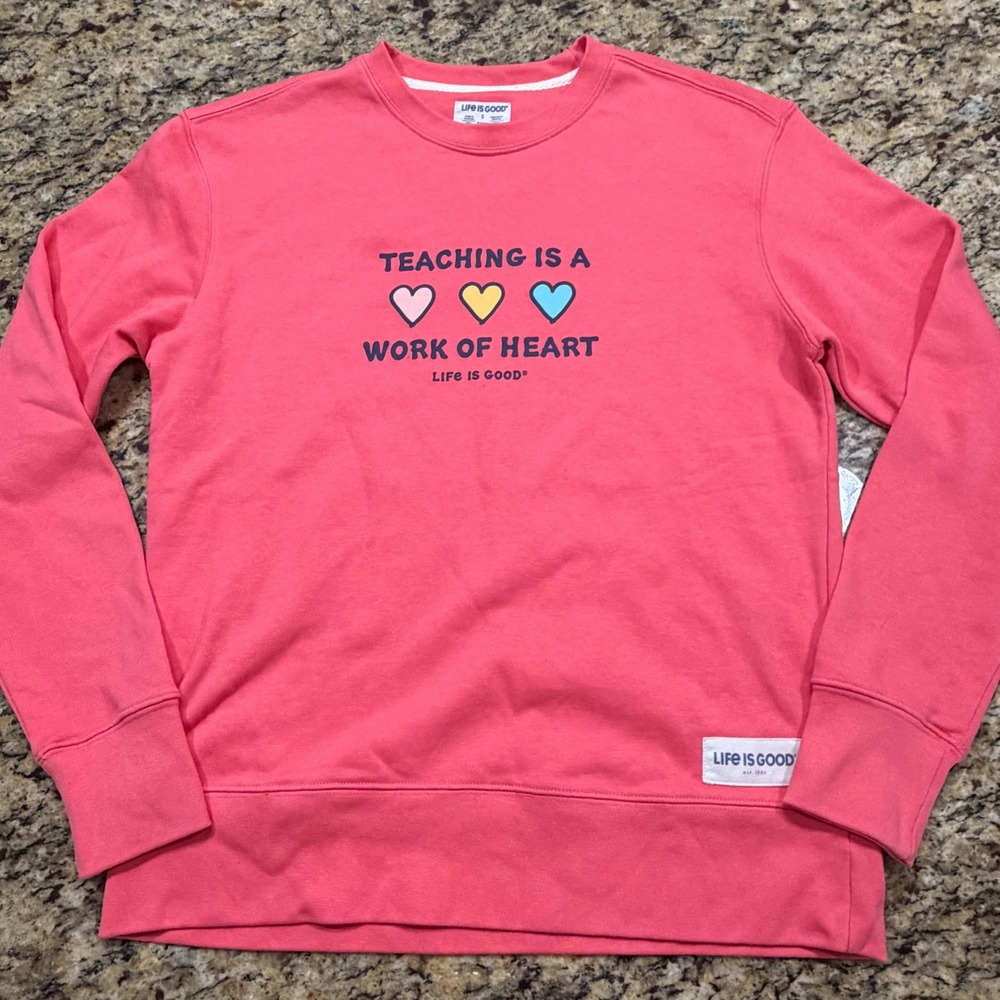 Life is Good Womens Teaching is a Work of Heart Sweatshirt Pink Small Teacher